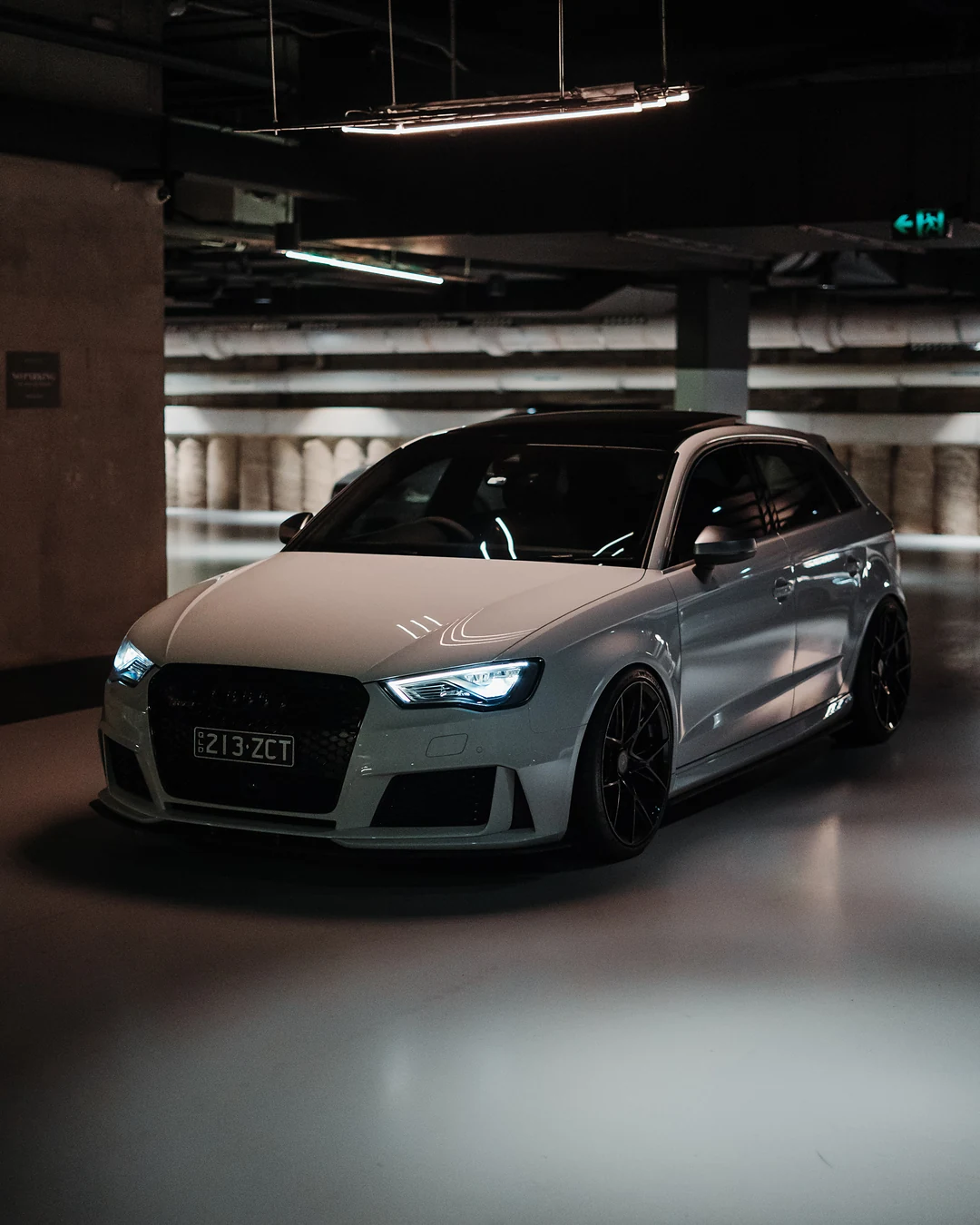 Silver Audi RS3 front three-quarter in an underground car park