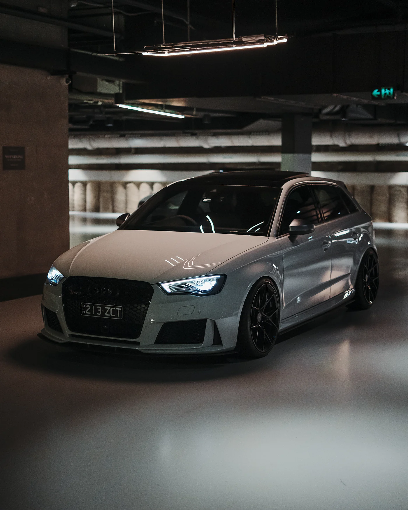 Grey Audi RS3 in an underground car park